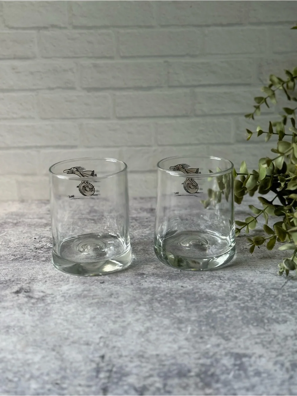 2 Vintage BC Comic Caveman on Wheel Dimpled Tumbler Glasses by Johnny Hart 70s